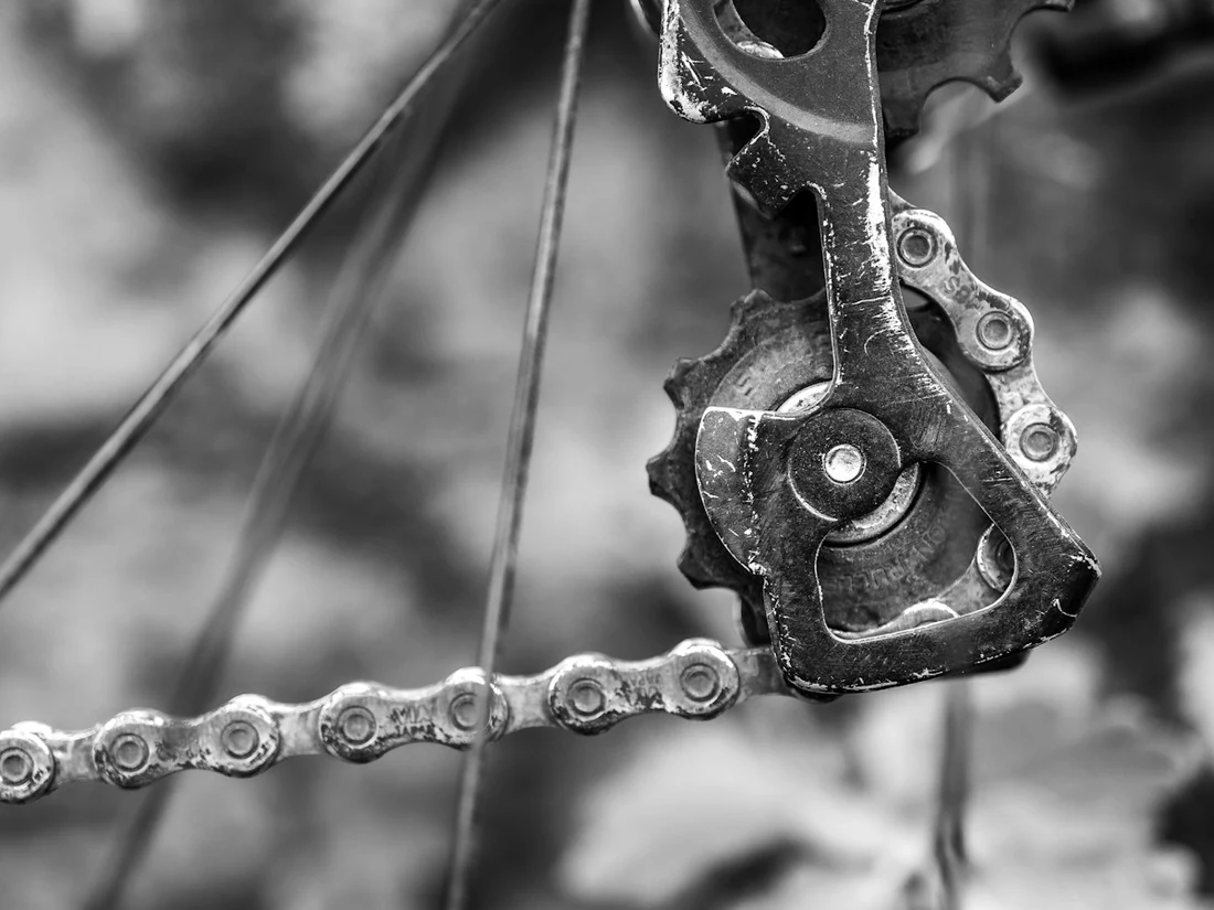 Bicycle chain running over a derailleur pulley
